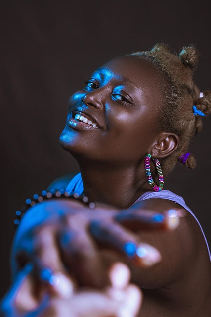 A person showcasing bold, colorful fashion choices with a confident pose, illustrating personal style.